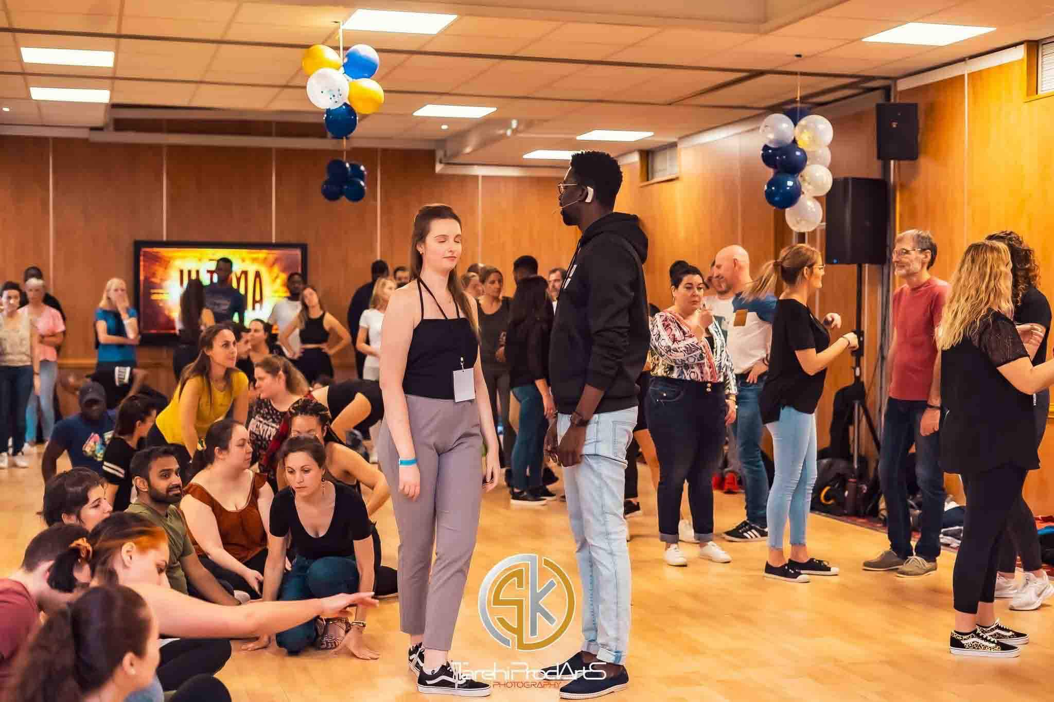 Explaining technique during a class.